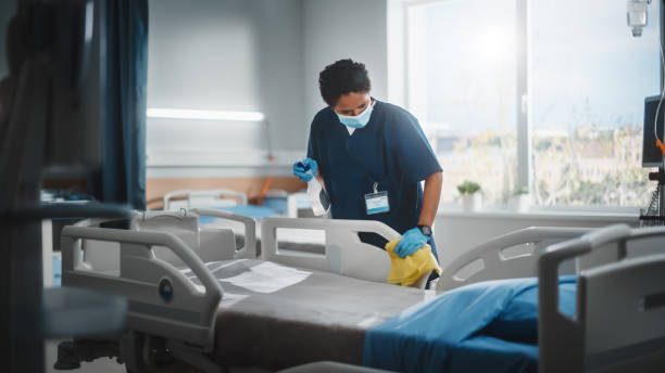 Hospital bed being cleaned professionally with antimicrobial coating