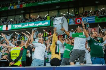 excited syrian fans at fifa event in qatar