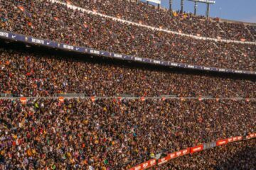 people in football stadium